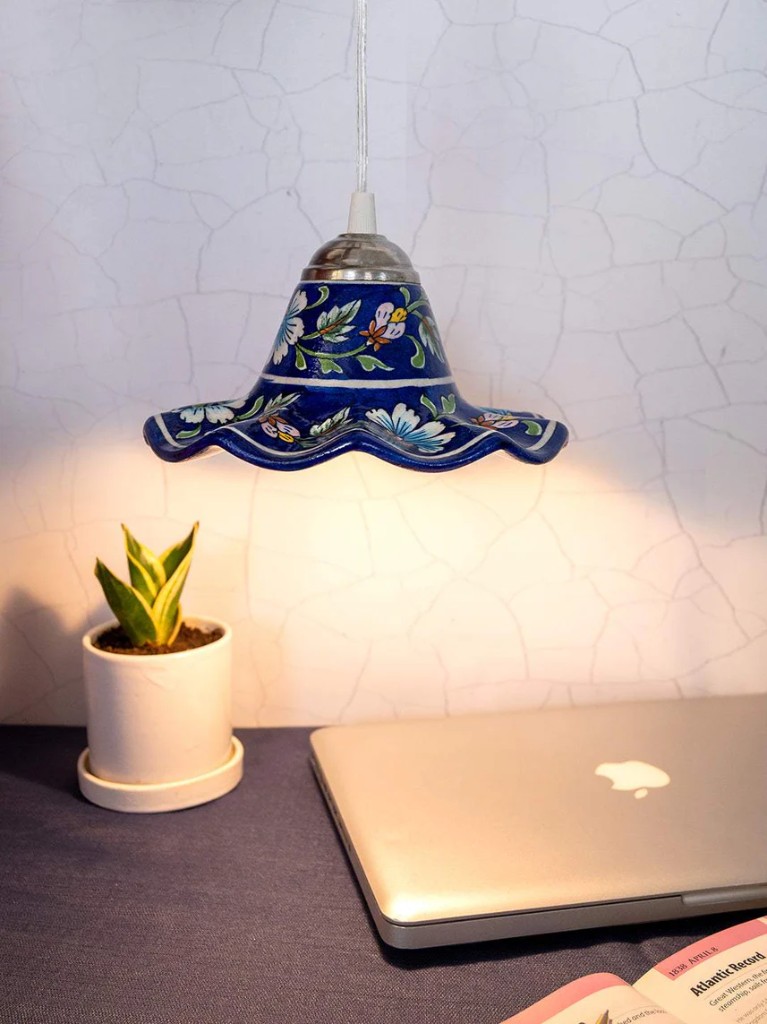Blue pottery hanging lamp in lifestyle interior