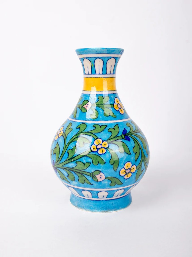 Turquoise blue pottery surahi vase studio photo